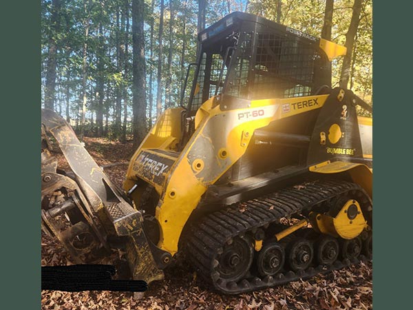 Skid steer stolen from Southgate property.
