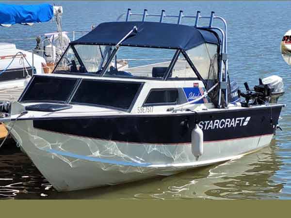 Starcraft boat in the water.