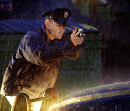 Police Officer In Rain