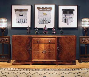 Professionally framed and based African beadwork really steals the show atop a mid-century French cabinet flanked by antique Chinese floor lamps