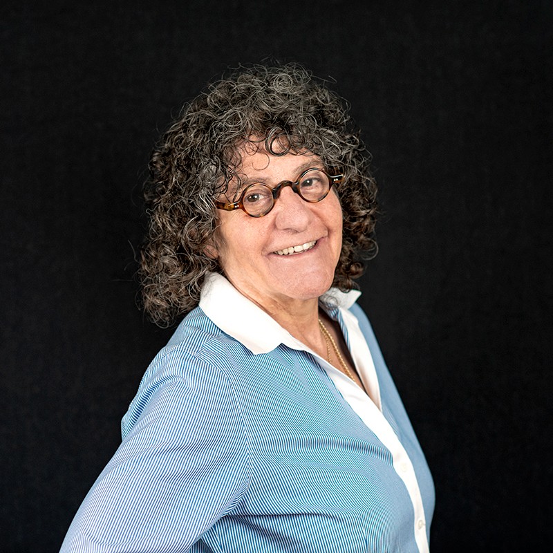 Headshot of Martha Walker on a black background