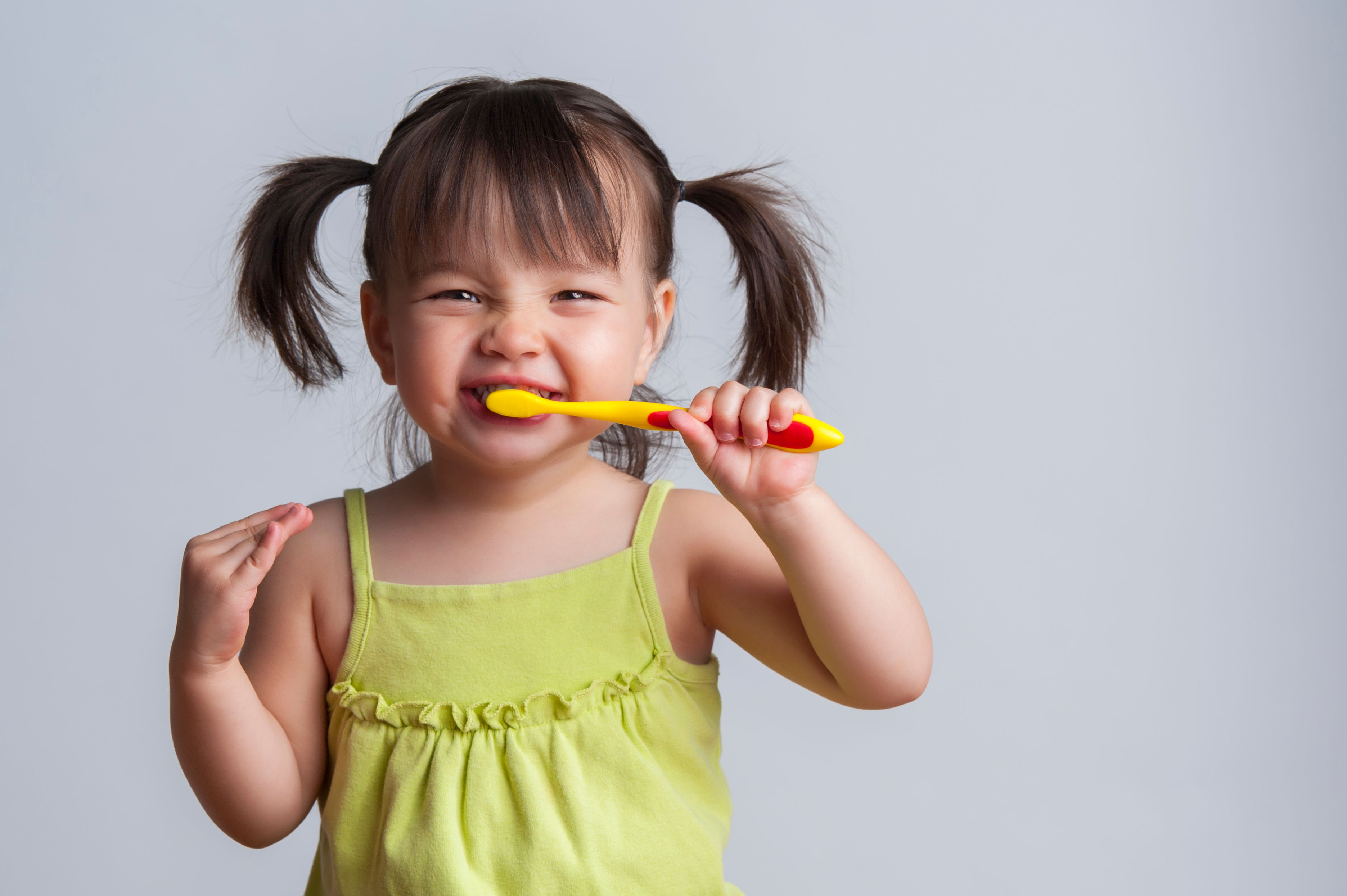 Brushing teeth of hot sale 1 year old