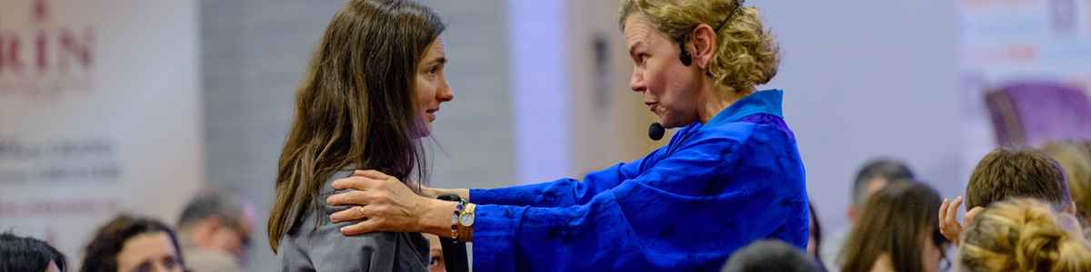 Dr. Laura Markham speaking at an event