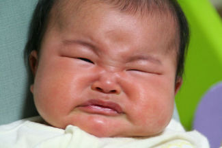 Newborn crying hot sale a lot