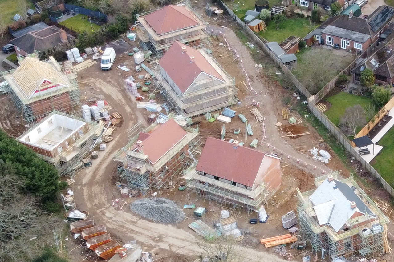 Aerial view of the last few plots being built at Poet's Corner, Oakley, as the site nears completion in May 2021