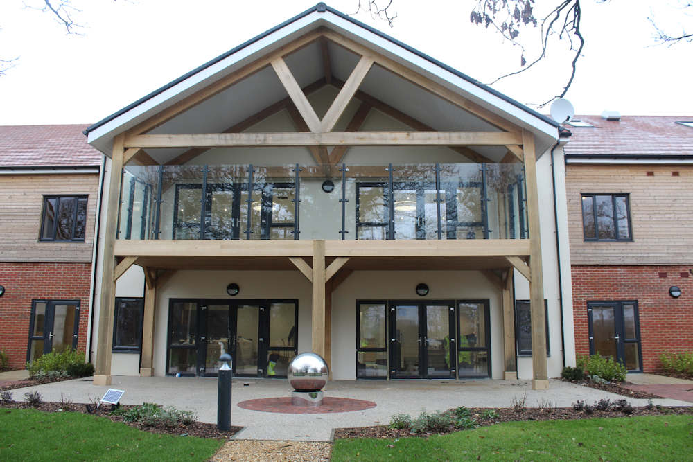 The finished Care Home showing the stunning exterior carpentry beam and cladding works