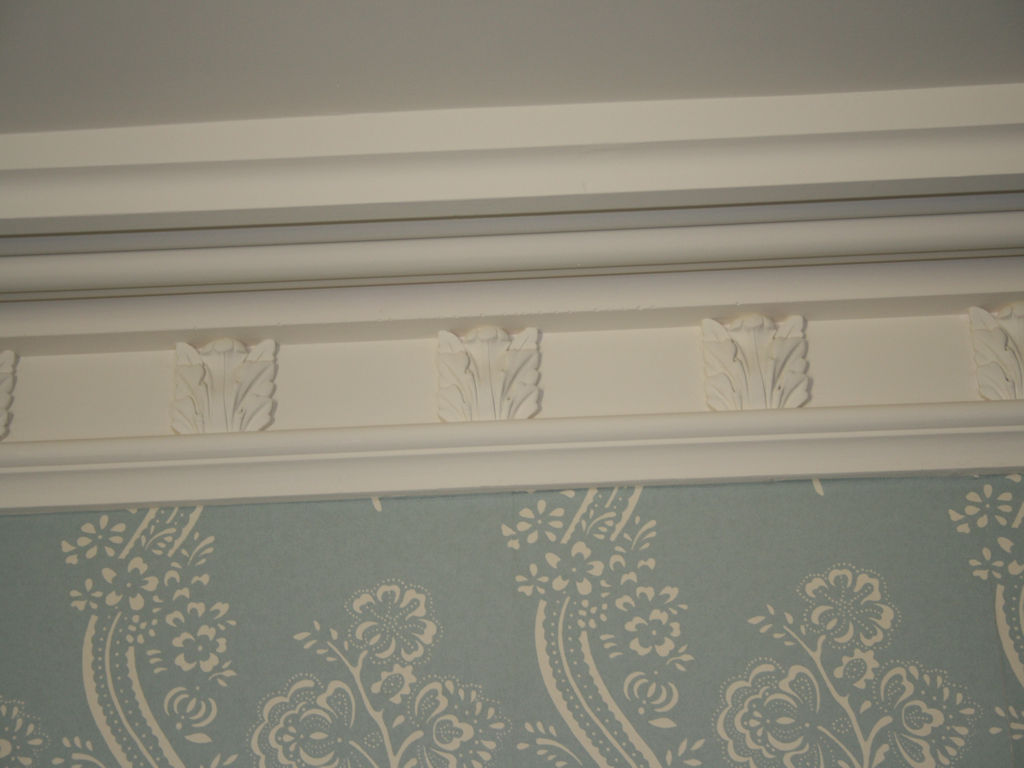 Restoring cornice and feature plaster moulding to keep true to the original architecture 