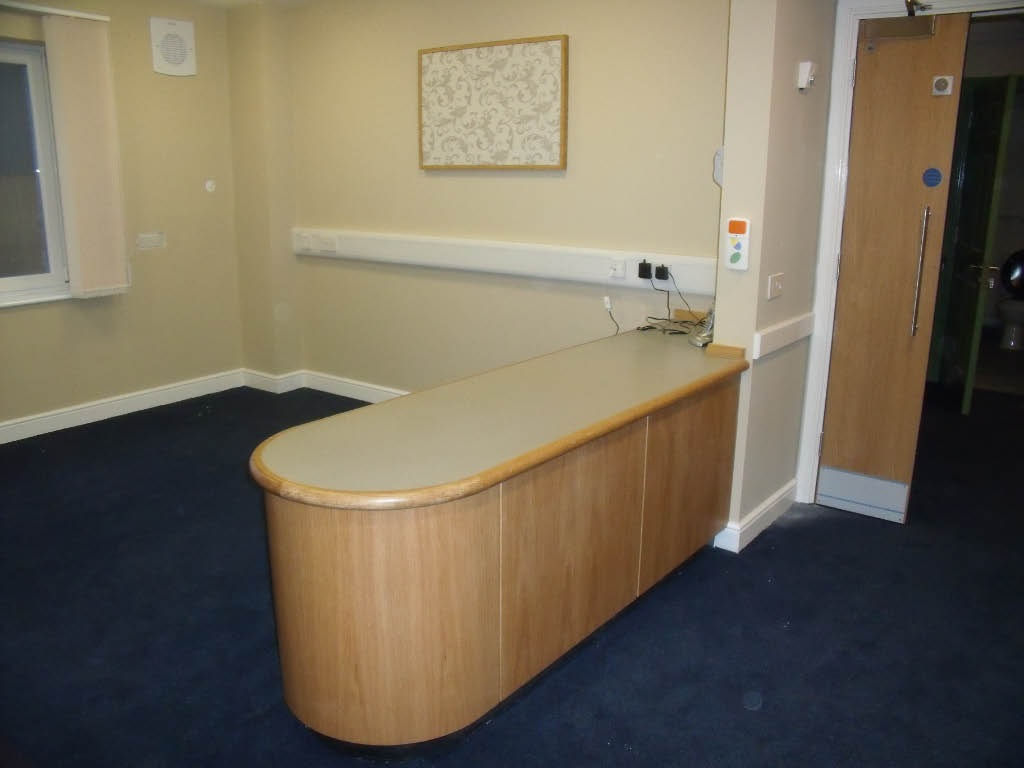 SC4 supplied and fitted the reception desk with melamine top